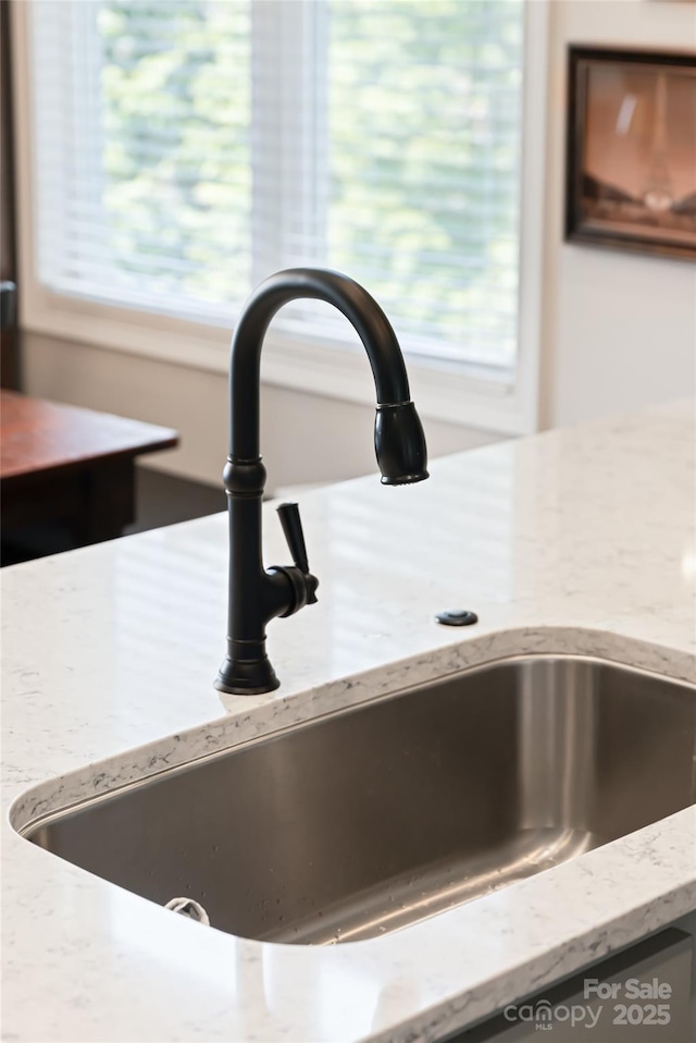116 Dalya Rd, Swannanoa, NC 28778 - kitchen view of a sink and light stone countertops