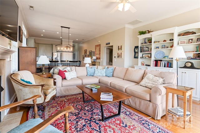 116 Dalya Rd, Swannanoa, NC 28778 - living area featuring crown molding, a ceiling fan, light wood finished floors, and recessed lighting