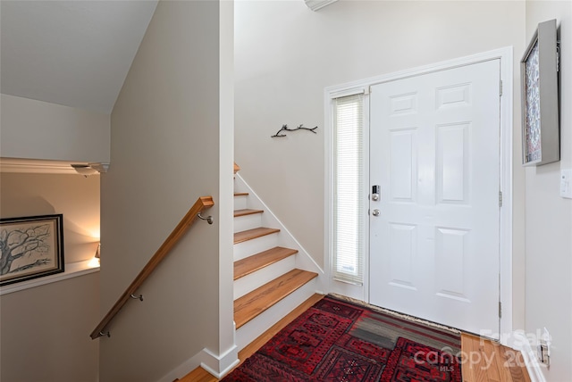 116 Dalya Rd, Swannanoa, NC 28778 - entryway with wood finished floors, stairs, and vaulted ceiling