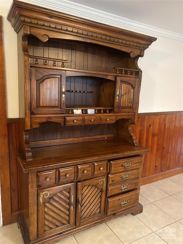 1410 Delwood Dr SW, Lenoir, NC 28645 - room details with wooden walls, ornamental molding, and a wainscoted wall