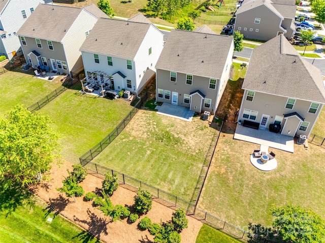 birds eye view of property with a residential view