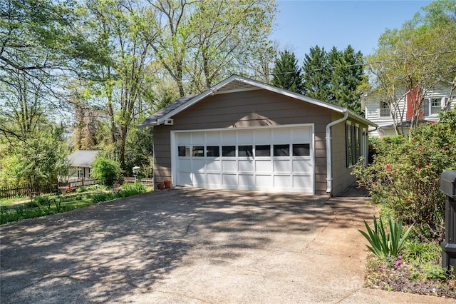 detached garage with fence