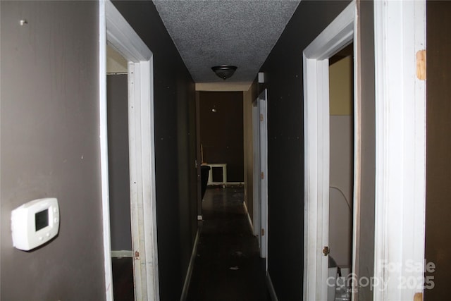 5164 Ralph Winchester Rd, Lenoir, NC 28645 - corridor with baseboards and a textured ceiling