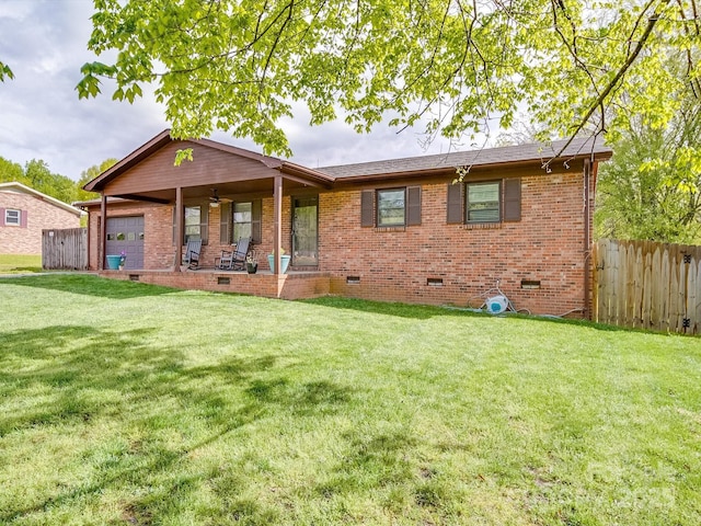 1315 Holshouser Rd, Rockwell, NC 28138 - back of house featuring crawl space, a yard, fence, and brick siding