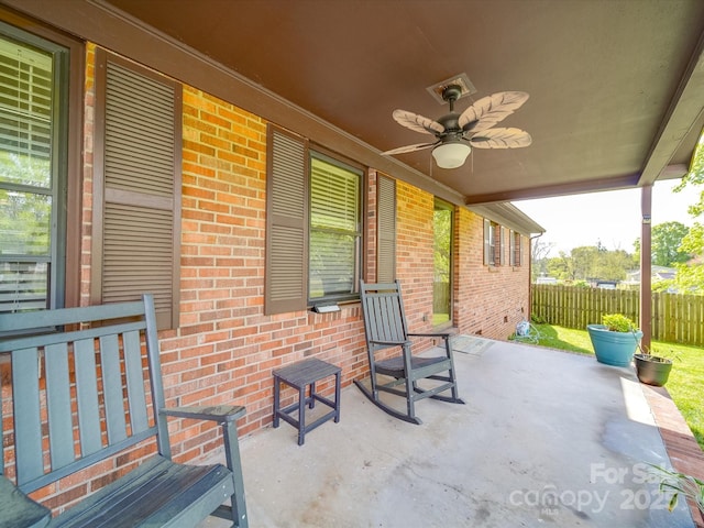 1315 Holshouser Rd, Rockwell, NC 28138 - view of patio / terrace with a ceiling fan and fence