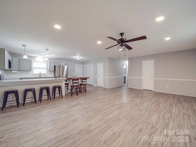1315 Holshouser Rd, Rockwell, NC 28138 - living area featuring light wood-style floors, ceiling fan, and recessed lighting