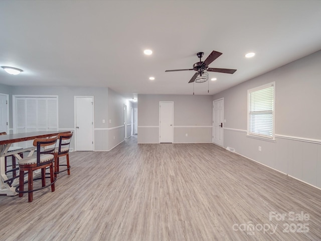 1315 Holshouser Rd, Rockwell, NC 28138 - unfurnished living room featuring visible vents, light wood-type flooring, a ceiling fan, and recessed lighting