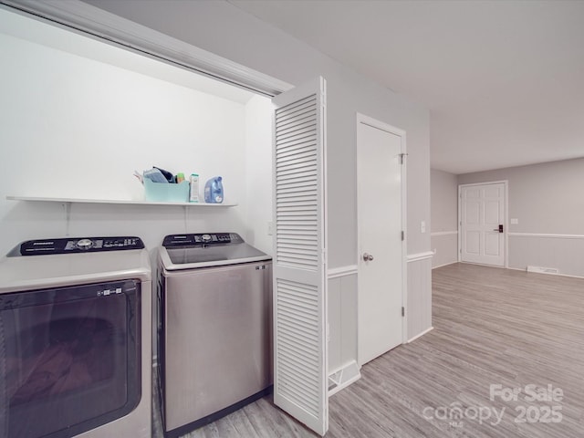 1315 Holshouser Rd, Rockwell, NC 28138 - laundry area with baseboards, light wood-type flooring, visible vents, laundry area, and washer and dryer
