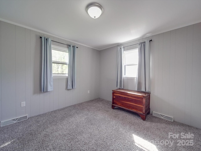 1315 Holshouser Rd, Rockwell, NC 28138 - spare room featuring visible vents, carpet flooring, and a healthy amount of sunlight