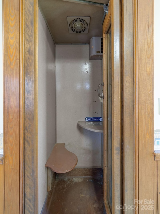 bathroom with visible vents and concrete flooring