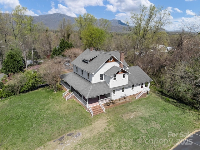 bird's eye view with a mountain view