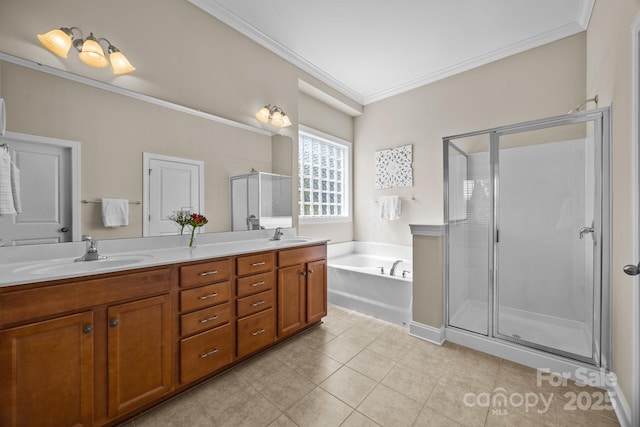 full bathroom featuring crown molding, a bath, a sink, a stall shower, and double vanity