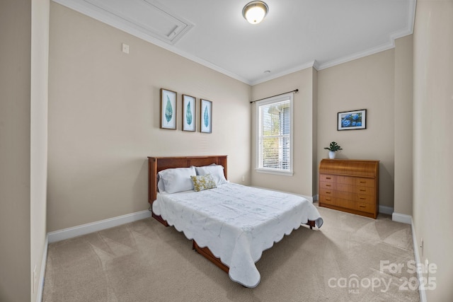 bedroom with baseboards, attic access, light colored carpet, and crown molding