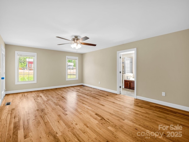 575 Hill Rd, Lincolnton, NC 28092 - unfurnished room with baseboards, ceiling fan, light wood finished floors, and visible vents
