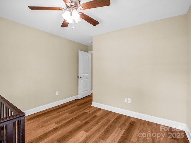 575 Hill Rd, Lincolnton, NC 28092 - spare room with baseboards, ceiling fan, and wood finished floors