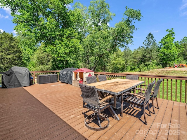 575 Hill Rd, Lincolnton, NC 28092 - wooden terrace featuring outdoor dining area and a grill