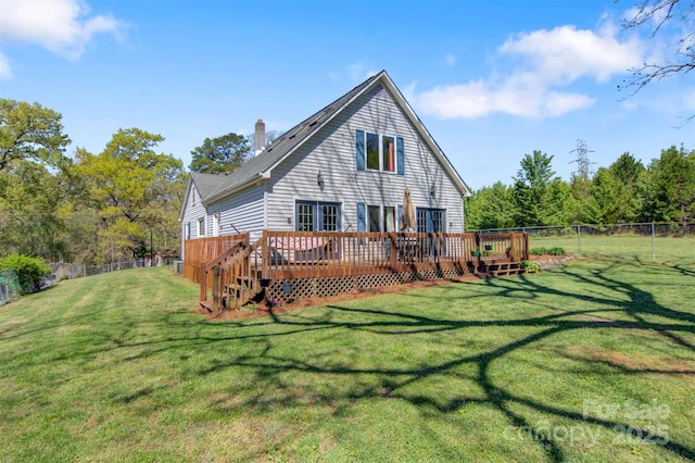 112 11th St NE, Hildebran, NC 28637 - rear view of house with a fenced backyard, a chimney, and a wooden deck