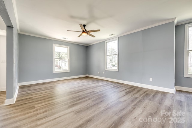 107 Maurice St, Monroe, NC 28112 - empty room with wood finished floors, crown molding, and ceiling fan