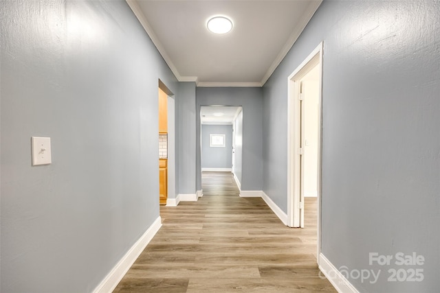 107 Maurice St, Monroe, NC 28112 - hall featuring light wood-style floors, baseboards, and ornamental molding