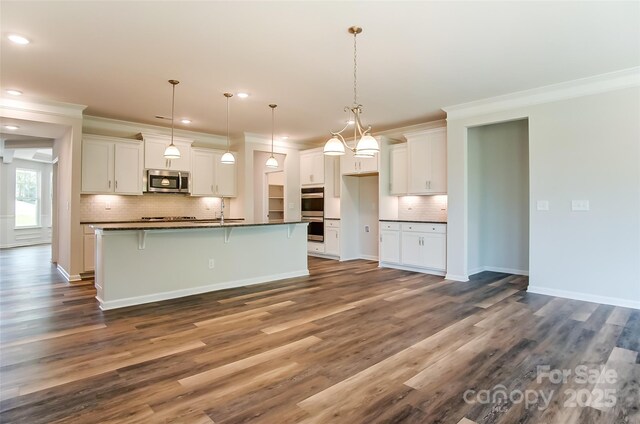 TBD Boomer Ct Unit 11, Statesville, NC 28677 - kitchen featuring stainless steel appliances, ornamental molding, and dark countertops