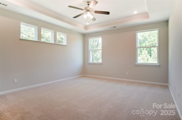 TBD Boomer Ct Unit 11, Statesville, NC 28677 - empty room featuring baseboards, ornamental molding, visible vents, a raised ceiling, and light colored carpet
