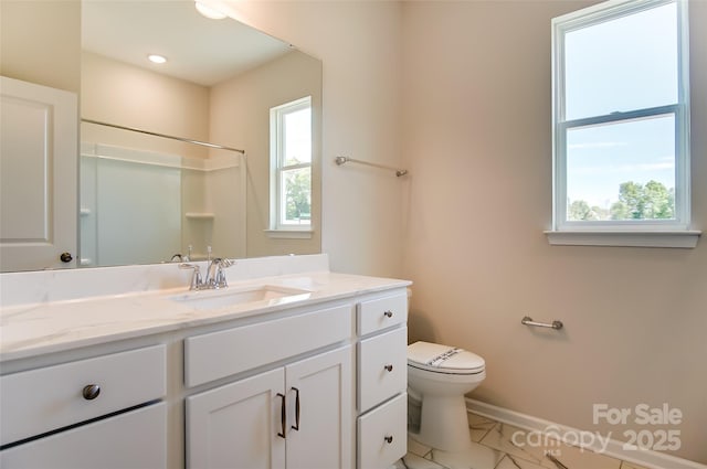 TBD Boomer Ct Unit 11, Statesville, NC 28677 - bathroom featuring plenty of natural light, vanity, baseboards, and toilet