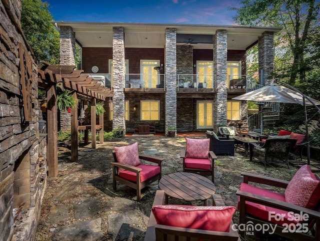 167 Trails End End, Lake Lure, NC 28746 - view of patio / terrace featuring french doors, an outdoor hangout area, and a balcony