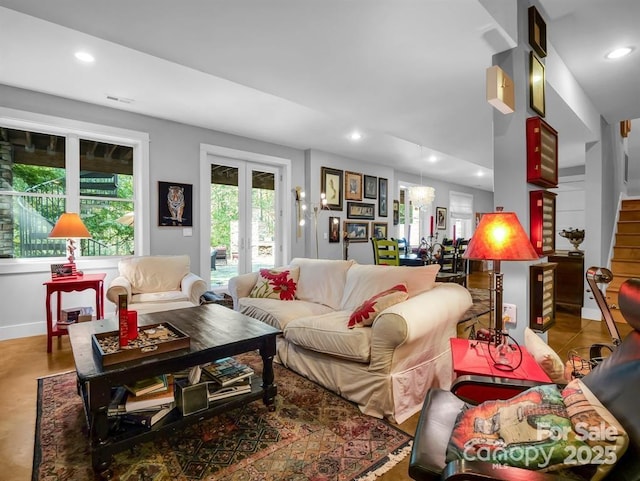 167 Trails End End, Lake Lure, NC 28746 - living room featuring french doors, baseboards, recessed lighting, and stairs