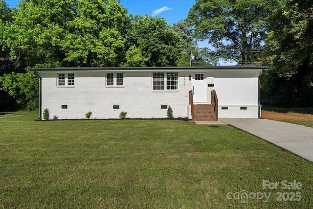 3423 Archer Ave, Charlotte, NC 28217 - view of front of house with crawl space, entry steps, a front yard, and brick siding