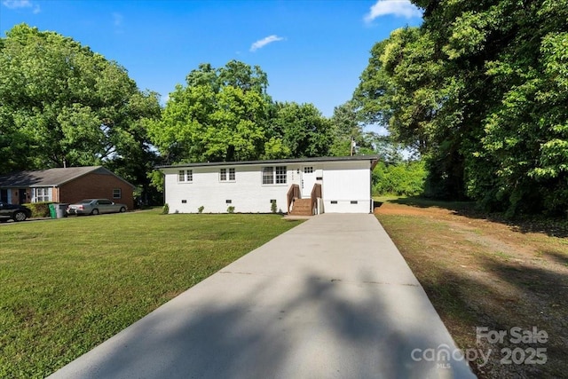 3423 Archer Ave, Charlotte, NC 28217 - view of front of home featuring driveway, a front lawn, and crawl space