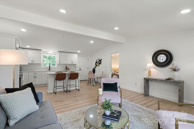 3423 Archer Ave, Charlotte, NC 28217 - living area with light wood-style flooring, recessed lighting, and baseboards