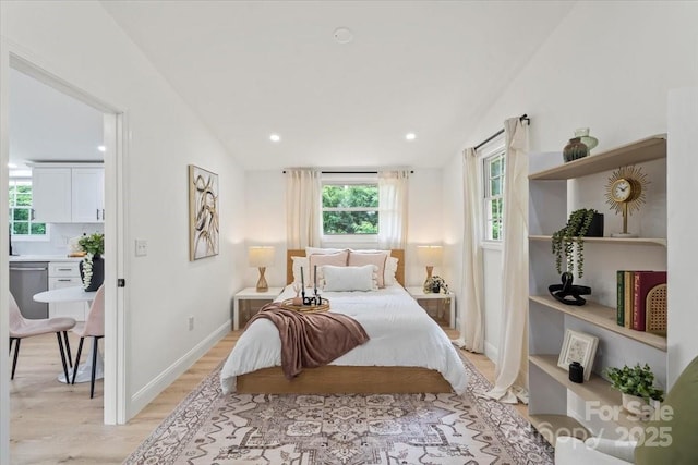 3423 Archer Ave, Charlotte, NC 28217 - bedroom with light wood finished floors, baseboards, vaulted ceiling, and recessed lighting