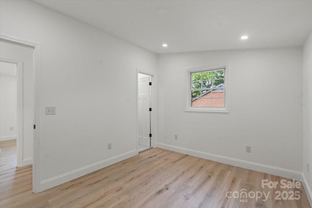 3423 Archer Ave, Charlotte, NC 28217 - unfurnished room featuring light wood-style floors, baseboards, and recessed lighting
