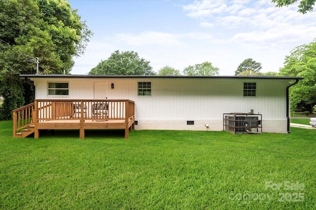 3423 Archer Ave, Charlotte, NC 28217 - back of property featuring crawl space, a deck, and a lawn