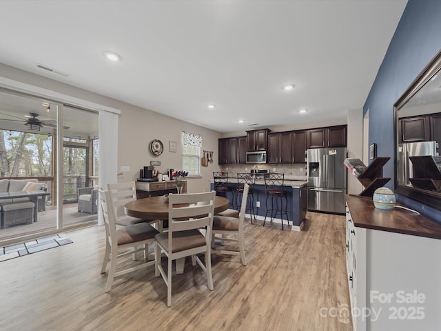 807 Oak Manor Dr SE, Concord, NC 28025 - dining space featuring recessed lighting, visible vents, light wood-type flooring, and a ceiling fan