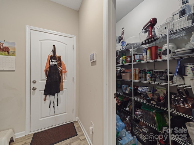 807 Oak Manor Dr SE, Concord, NC 28025 - interior space with baseboards and wood finished floors