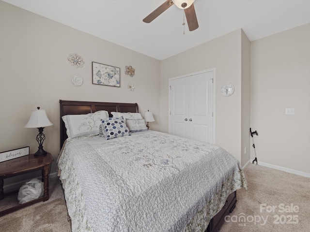 807 Oak Manor Dr SE, Concord, NC 28025 - carpeted bedroom featuring a closet, ceiling fan, and baseboards