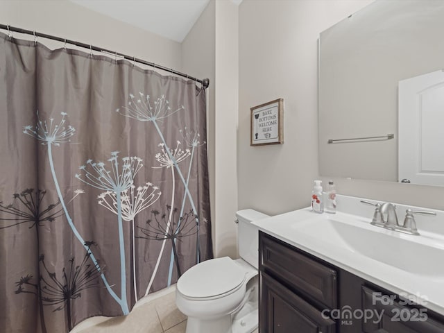 807 Oak Manor Dr SE, Concord, NC 28025 - full bathroom featuring toilet, curtained shower, vanity, and tile patterned flooring