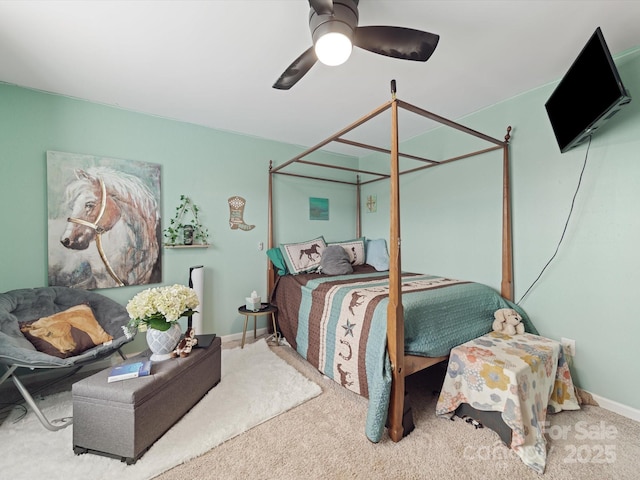 807 Oak Manor Dr SE, Concord, NC 28025 - carpeted bedroom featuring baseboards and ceiling fan