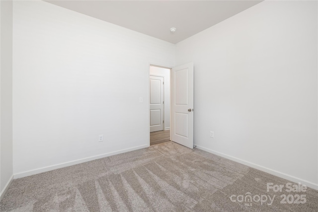 538 Williamson St, Charlotte, NC 28208 - spare room featuring carpet floors, baseboards, and a smoke detector