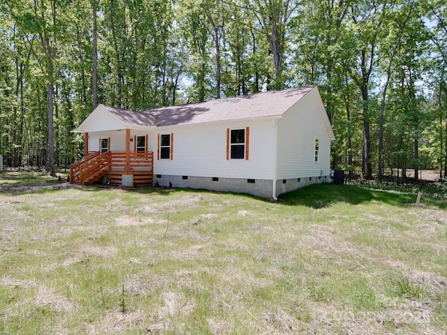 1241 Pitts Rd, Chester, SC 29706 - view of front facade featuring central air condition unit, crawl space, roof with shingles, a front yard, and a deck