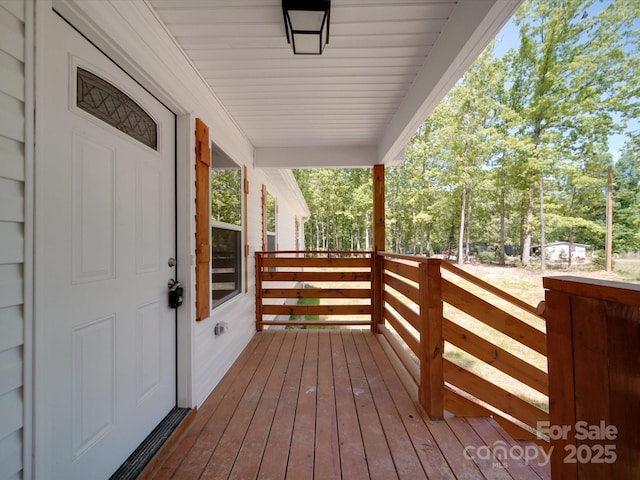 1241 Pitts Rd, Chester, SC 29706 - wooden deck featuring covered porch