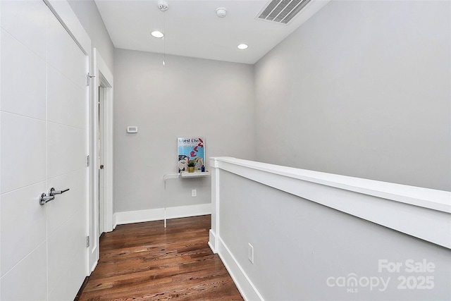 1416 S Church St, Charlotte, NC 28203 - hall featuring an upstairs landing, dark wood finished floors, baseboards, visible vents, and recessed lighting