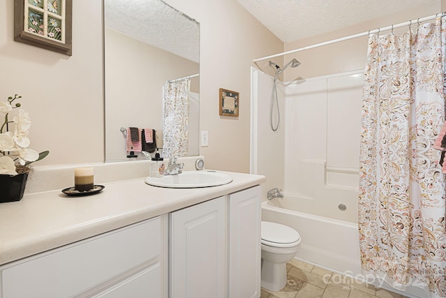 54 Golddigger Dr, Candler, NC 28715 - bathroom featuring vanity, a textured ceiling, toilet, and shower / bath combo