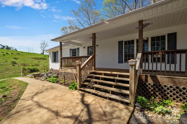 property entrance featuring covered porch
