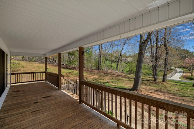 wooden terrace featuring a porch