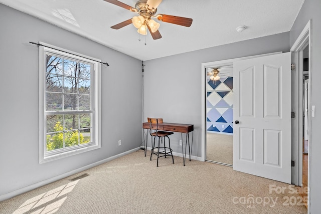 bedroom with ceiling fan, baseboards, visible vents, and carpet floors