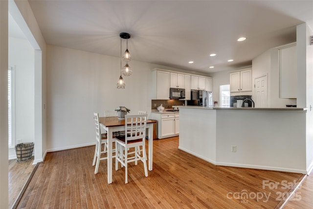 3040 Sunshower Hts, York, SC 29745 - dining area with recessed lighting, light wood-type flooring, and baseboards