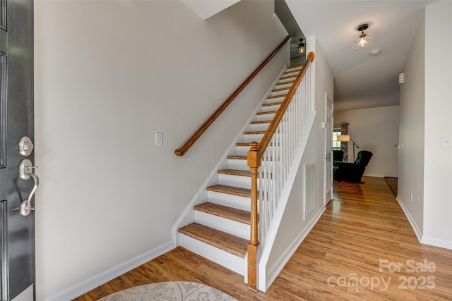 3040 Sunshower Hts, York, SC 29745 - stairs with wood finished floors and baseboards