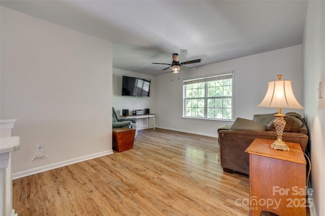 3040 Sunshower Hts, York, SC 29745 - living area featuring light wood finished floors, baseboards, and a ceiling fan